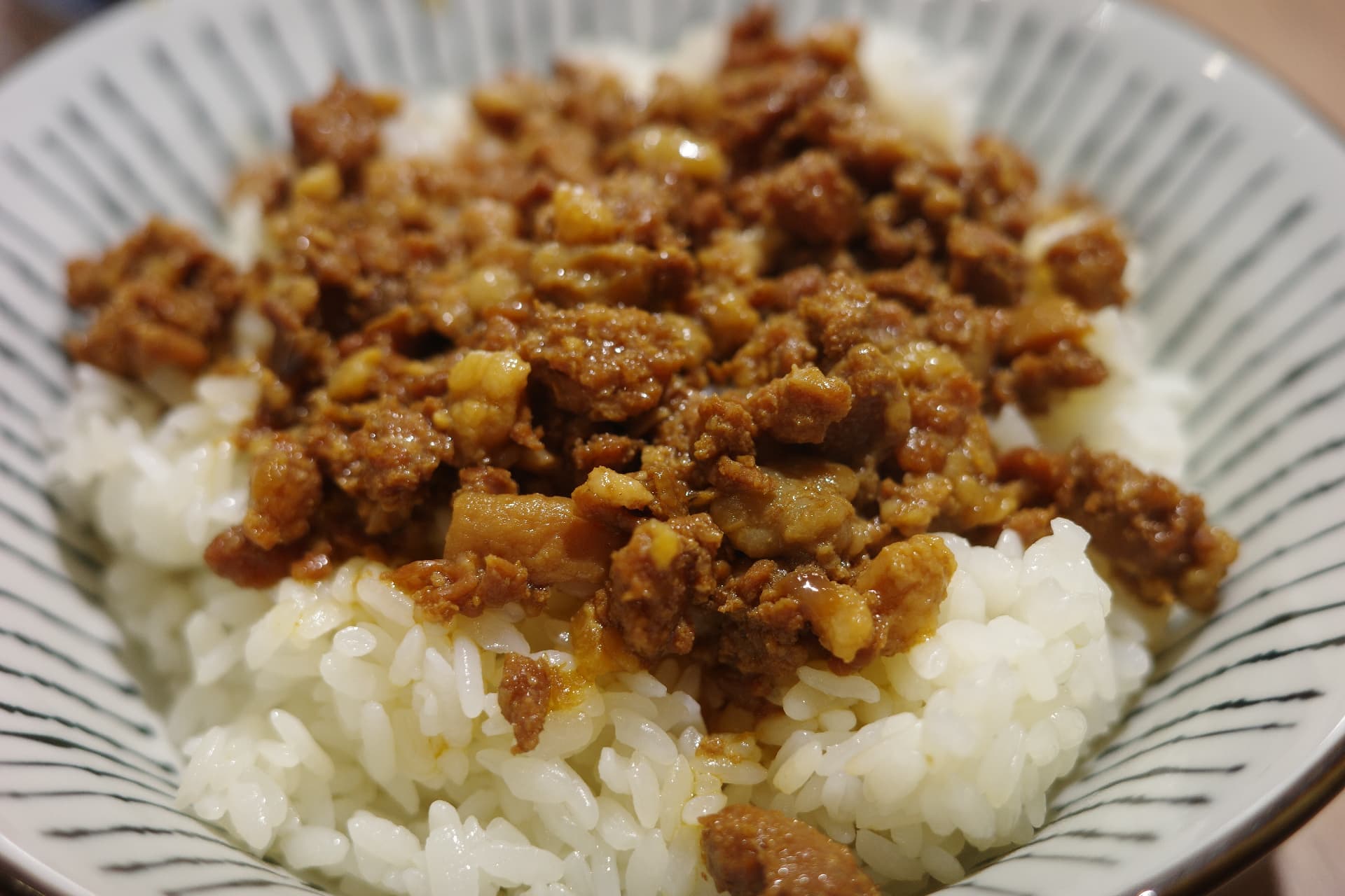 Xu Family’s braised pork rice, rich and savory sauce over warm, fluffy rice